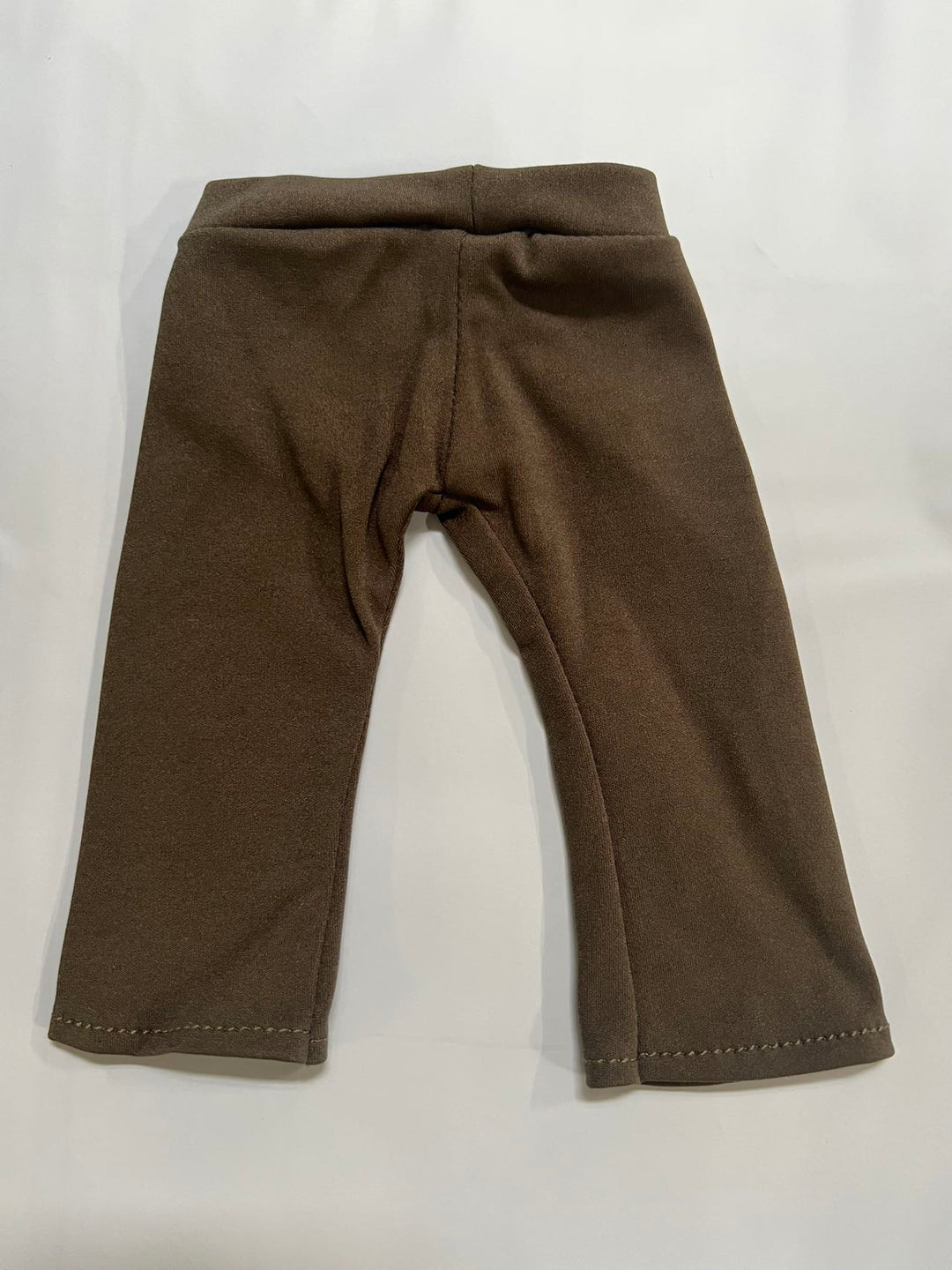 Meddy Teddy olive green yoga leggings laid flat on a white surface