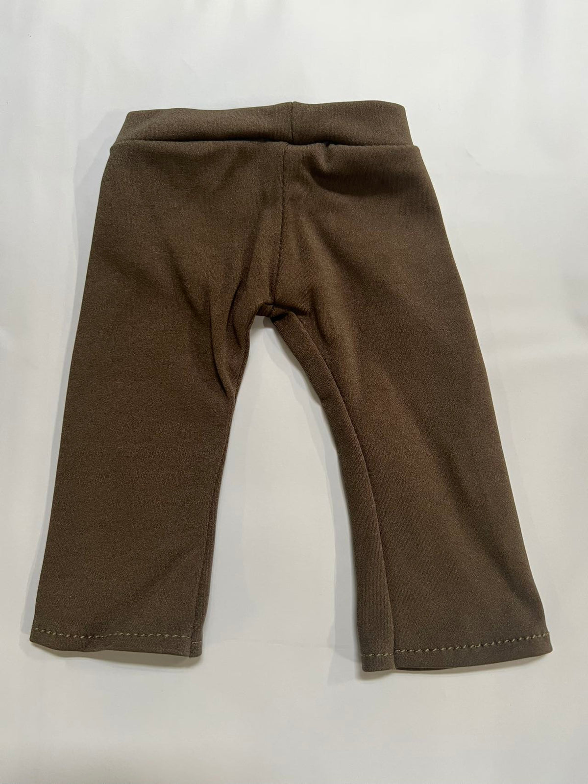 Meddy Teddy olive green yoga leggings laid flat on a white surface